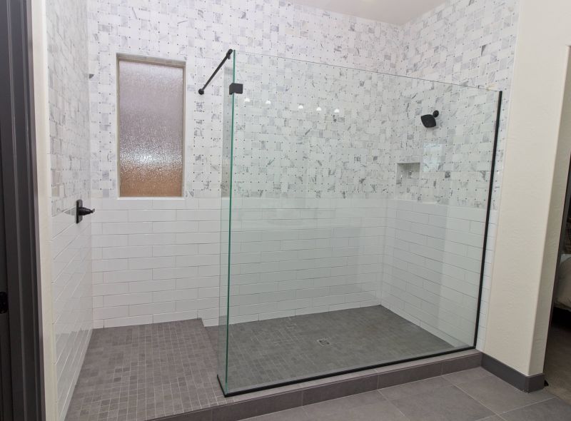 Open Shower Space with Dark Tile Accents